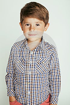 Little cute boy on white background gesture