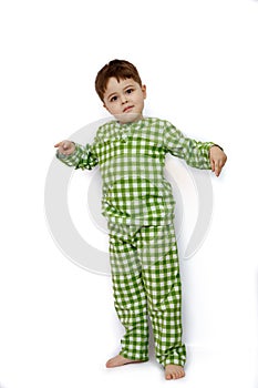 Little cute Caucasian boy on white isolated background posing, showing emotions and smiling