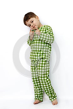 Little cute Caucasian boy on white isolated background posing, showing emotions and smiling