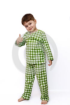 Little cute Caucasian boy on white isolated background posing, showing emotions and smiling