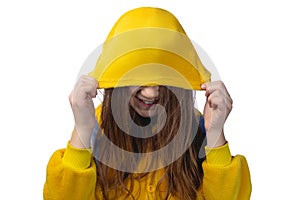 Little cute cheerful girl 10 years old posing in yellow pajamas. Studio photo