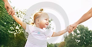 Little Cute girl take hands with her relatives people