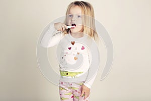 Little cute girl with toothbrush