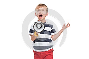 Little cute kid baby boy holding in hand and speaking in electronic gray megaphone