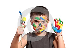 Little cute kid with colors on his face