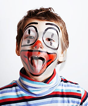 Little cute real boy with facepaint like clown, pantomimic expre