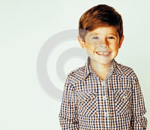 Little cute real boy on white background gesture smiling close u