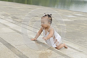 Little daughter climb stairs