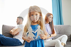 Little daughter girl doesn`t want parents to be divorced