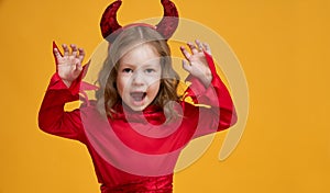 Little devil on yellow background