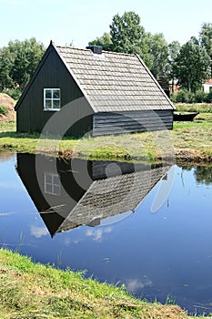 Little dutch wooden barn in a peat area photo