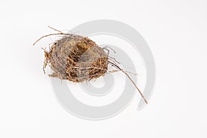 Little empty bird nest on a white background