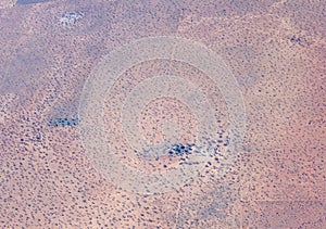 little farm and sparse vegetation on Kalahari sand, north-west of Leonardville, Namibia