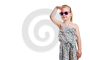 Little fashion girl in sunglasses isolated on white background