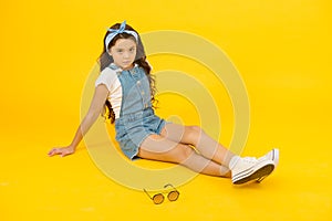 Little fashionista. Carefree happy childhood. Modern clothing for teen. Cute small kid fashion girl. Fashion accessories