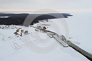 Little ferry ship in port Triigi at winter