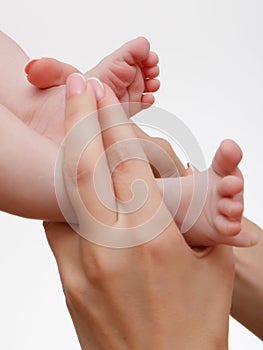 Little fingers. Legs newborn baby . Baby feet . Happy family concept. Beautiful conceptual image of motherhood