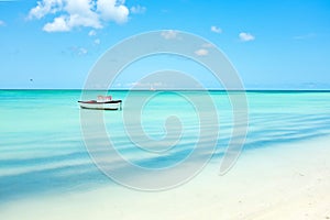 Little fishing boat in the caribbean sea on Aruba island