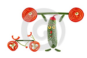 Little funny cucumber raises the bar next to it stands a bicycl