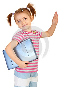 Little funny girl with laptop