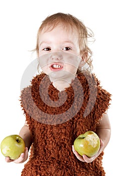 Little funny Neanderthal boy in a suit with dirty face eating an apple.