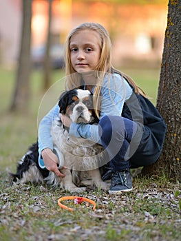 Little gilr with dog