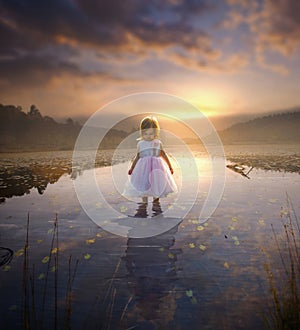 Little girl and adult reflection