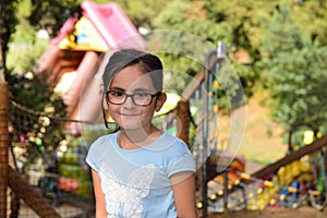 Little girl in an adventure park