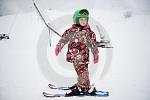 Little girl on Alpine ski