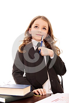 Little girl as thoughtful business woman