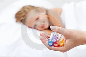 Little girl awaiting homeopathic medication photo