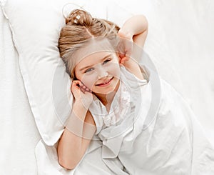 Little girl awaken rested photo