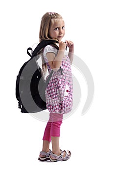 Little girl with backpack photo