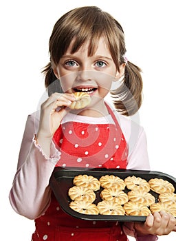 Little girl baking Christmas cookies