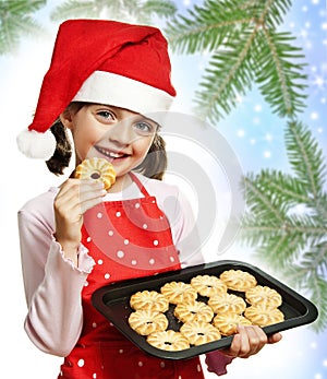 Little girl baking Christmas cookies