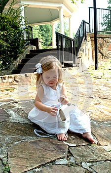 Little Girl and Ballet Slippers