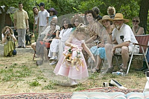 Little girl with basket of flowers at a traditional Jewish wedding in Ojai, CA