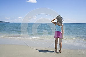 Little girl and beach