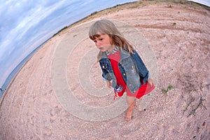 Little girl on beach photo