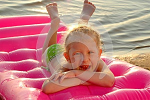 The little girl on a beach