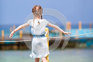 Little girl at the beach during caribbean vacation