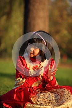 Little girl is beating time photo