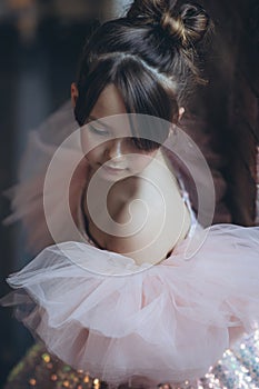 Little girl in a beautiful dress. Happy fashionable child.