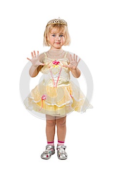 Little girl in a beautiful yellow dress and crown on white back