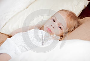 Little girl in bed