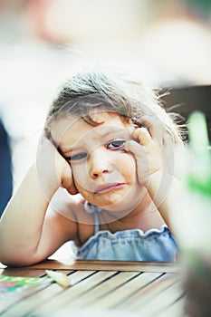 Little girl being sad