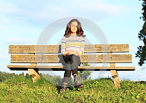 Little girl on bench