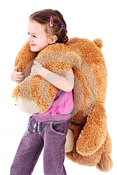 Little girl with big teddie bear