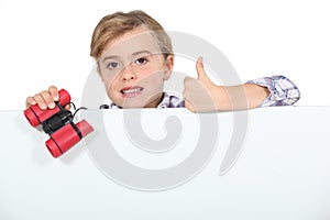 Little girl with binoculars