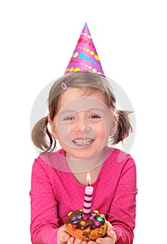 Little girl with birthday cake